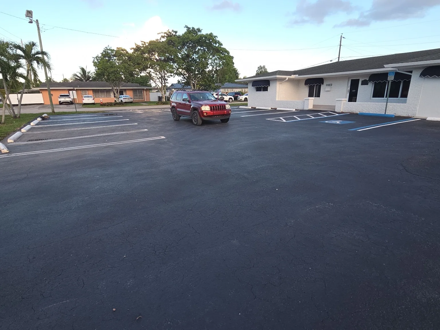 Freshly sealcoated and striped commercial parking lot in South Florida