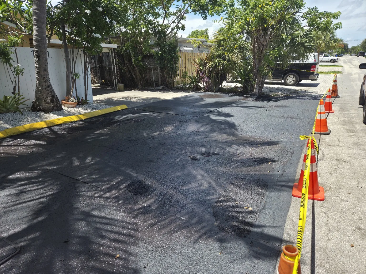 Completed sealcoat work on a private access area